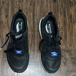 Skechers Black Athletic Shoes with Blue Accents